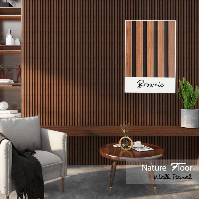 Revestimiento Wall Panel acabado Brownie en salón moderno con butaca y mesa auxiliar